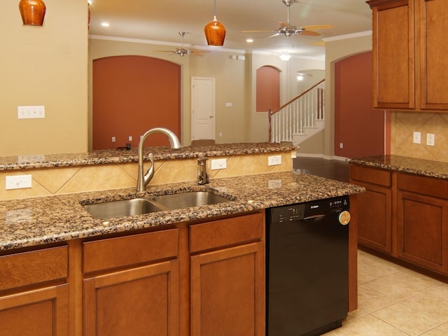 kitchen featuring sink, ceiling fan, black dishwasher, ornamental molding, and stone countertops