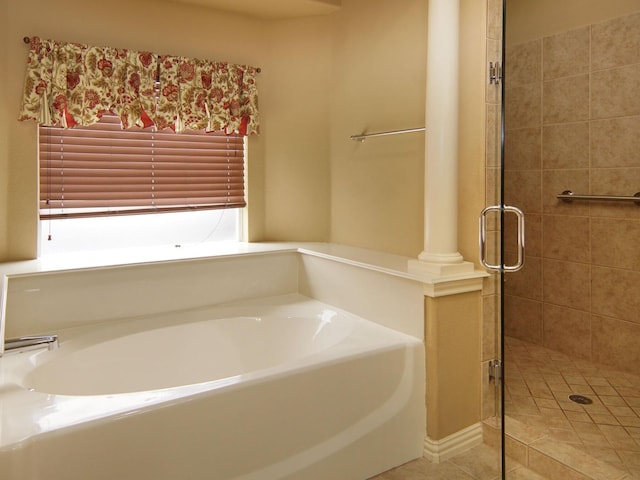 bathroom featuring tile patterned floors and plus walk in shower