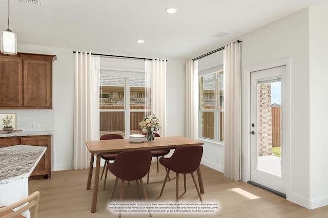 dining room featuring light hardwood / wood-style floors