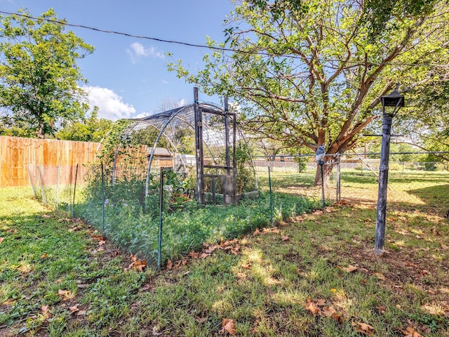 312 Columbus, Coleman, TX 76834 - view of yard with a fenced backyard and a vegetable garden