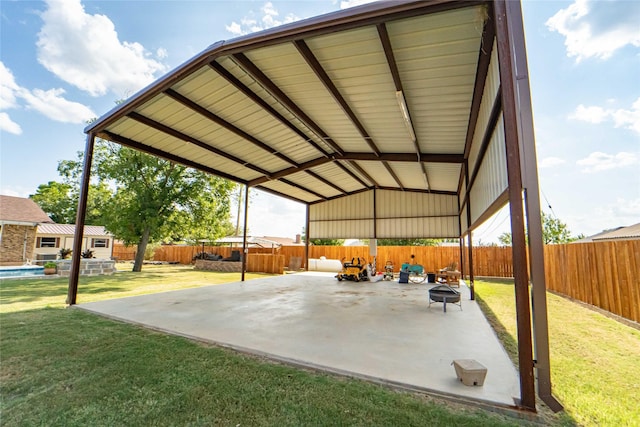 view of patio / terrace with an outdoor fire pit