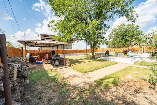 view of yard with a pergola and a fenced in pool