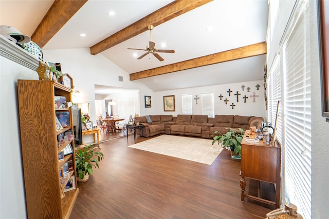 living room featuring vaulted ceiling with beams, dark wood-type flooring, and ceiling fan