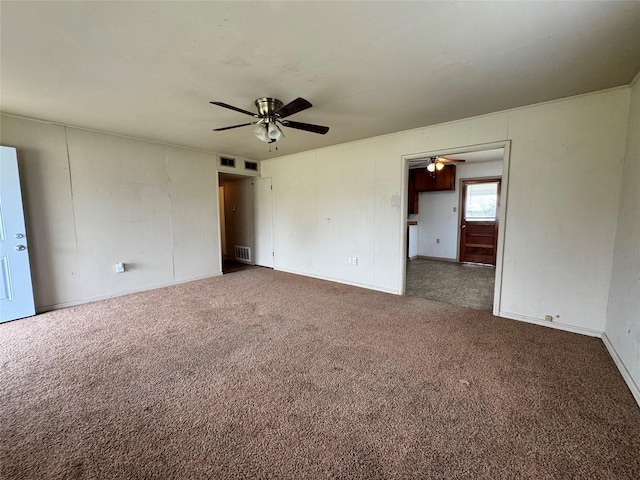 carpeted empty room with ceiling fan