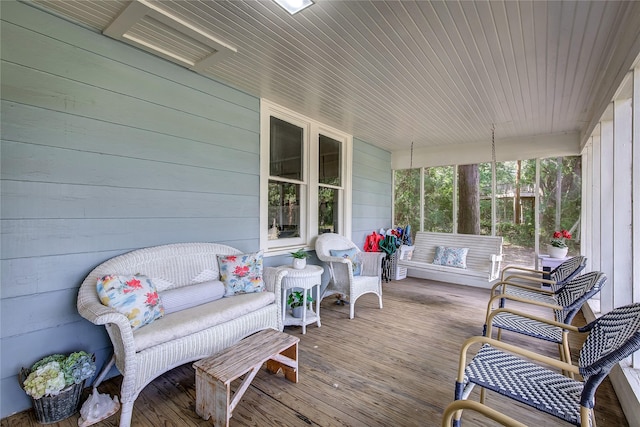 deck featuring a porch and an outdoor living space