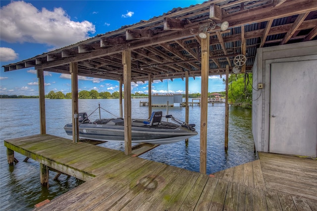 view of dock with a water view