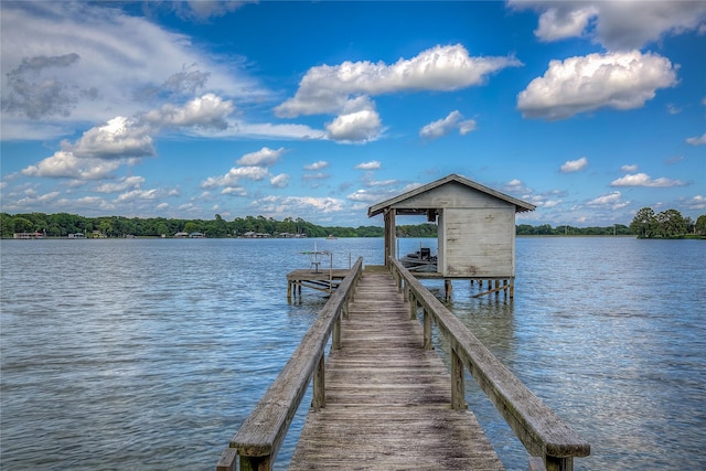 dock area with a water view