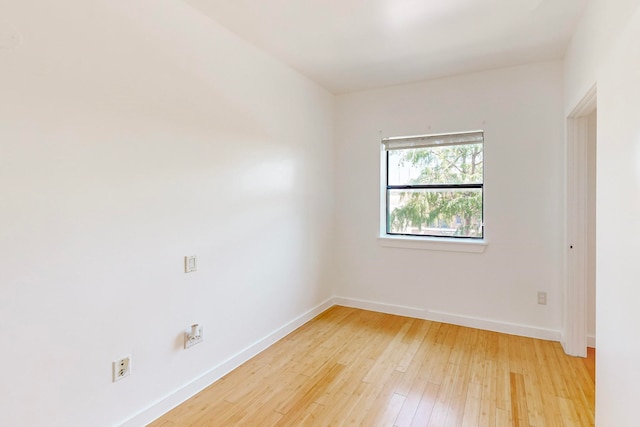 unfurnished room featuring light wood-type flooring