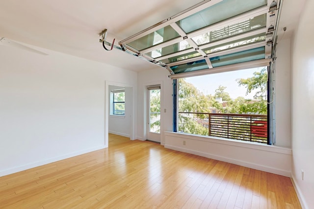 spare room with light wood-type flooring