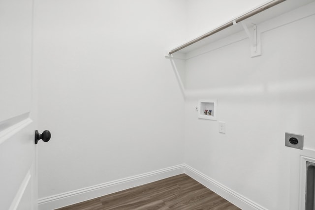 clothes washing area featuring electric dryer hookup, hookup for a washing machine, and dark hardwood / wood-style flooring