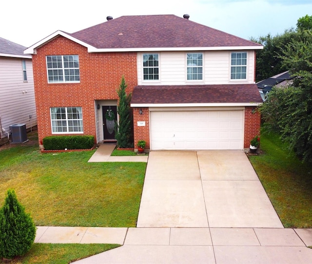 view of front of home featuring a garage, central AC, and a front yard