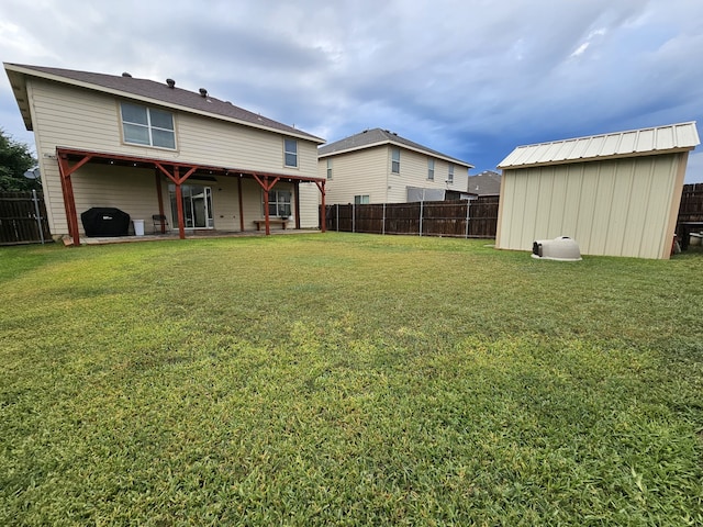 view of yard featuring a patio area and a fenced backyard