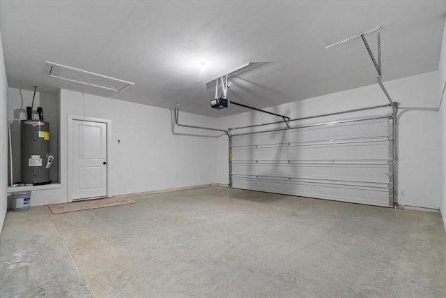 garage featuring a garage door opener and water heater