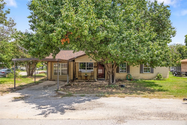 view of front of house with a carport