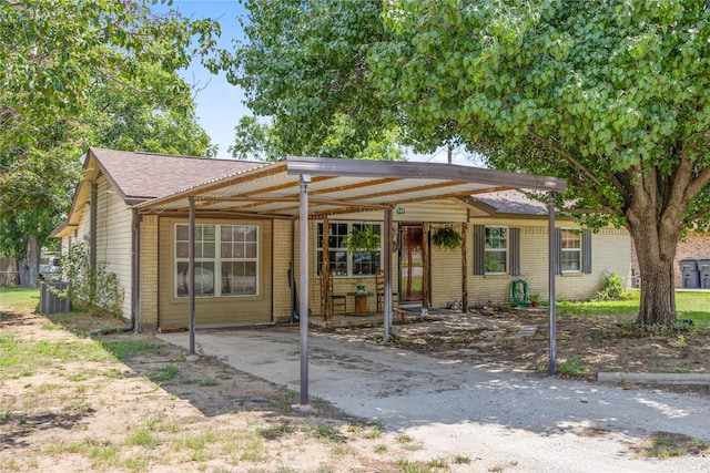 view of front of house with a carport