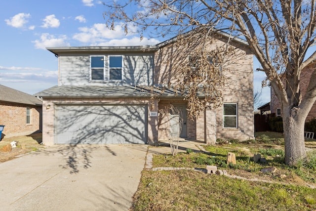 front of property with a garage