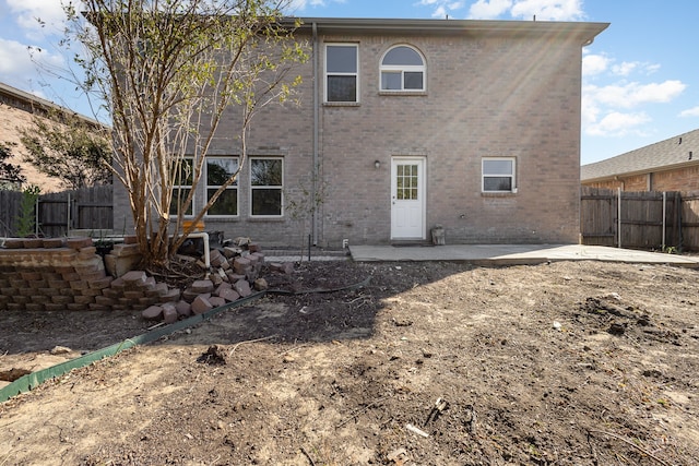 rear view of house featuring a patio area