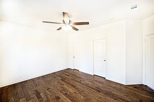 unfurnished bedroom with dark hardwood / wood-style floors and ceiling fan