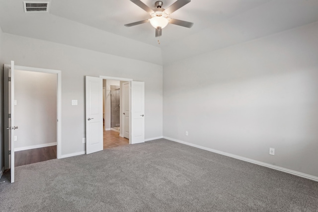 unfurnished bedroom featuring ceiling fan and light carpet