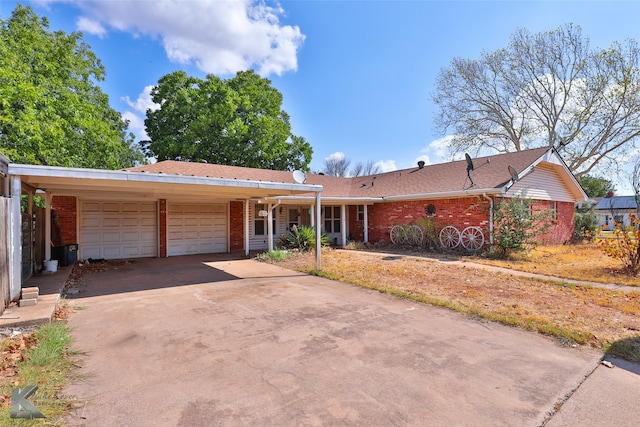 ranch-style house featuring a garage