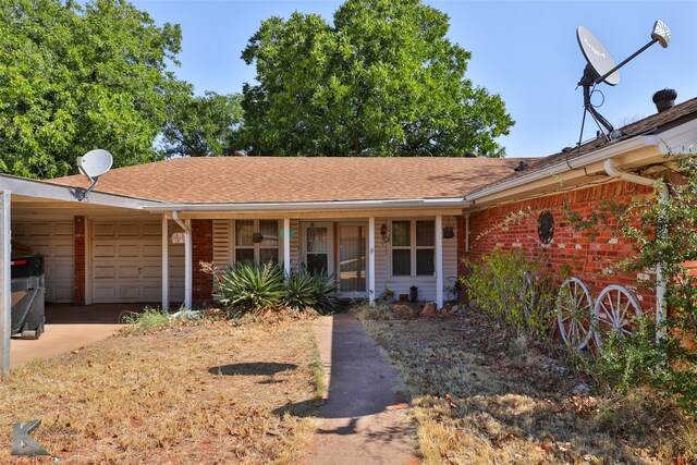 ranch-style house featuring a garage