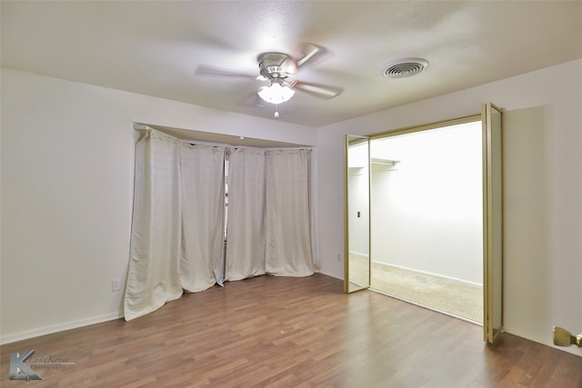 unfurnished bedroom featuring carpet flooring and ceiling fan