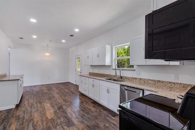 kitchen featuring black appliances, pendant lighting, white cabinets, and sink