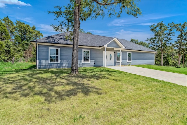 ranch-style house with a front lawn