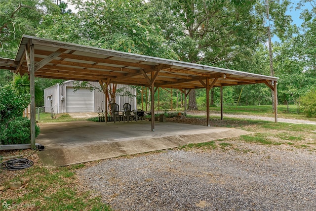 view of vehicle parking featuring a carport