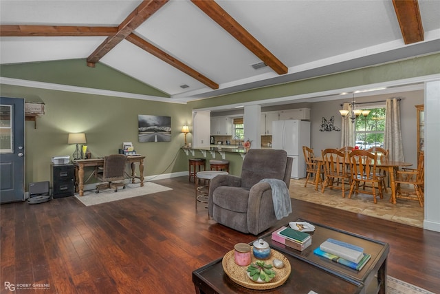 living room with dark wood-type flooring, lofted ceiling with beams, and an inviting chandelier