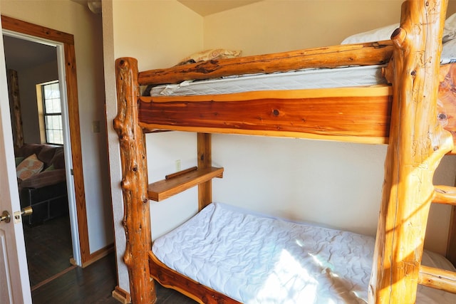 bedroom featuring wood finished floors