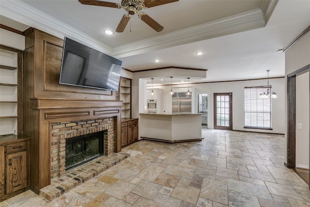 unfurnished living room with light tile patterned floors, a fireplace, ceiling fan with notable chandelier, and crown molding