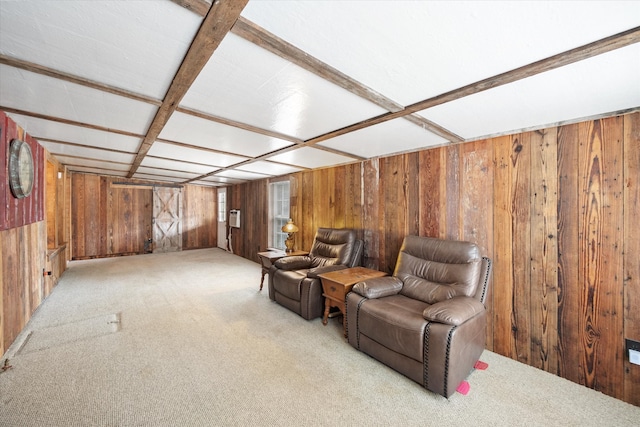 sitting room with light carpet, coffered ceiling, and wooden walls