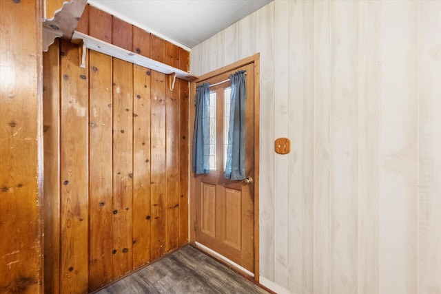 doorway to outside featuring dark hardwood / wood-style flooring