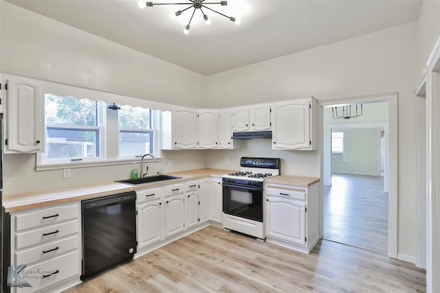 kitchen featuring light hardwood / wood-style flooring, a chandelier, dishwasher, white range with gas cooktop, and sink