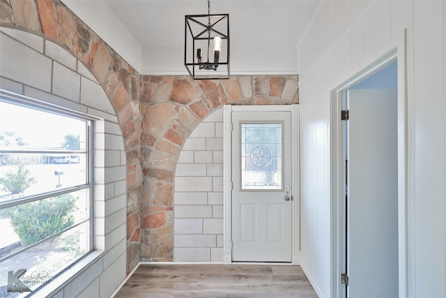 foyer featuring plenty of natural light and light hardwood / wood-style floors