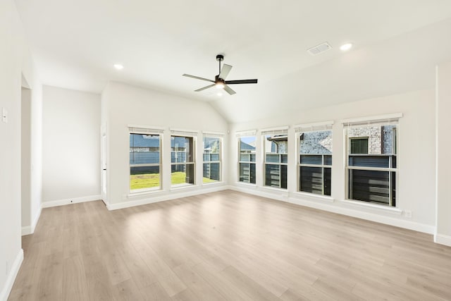 interior space with light hardwood / wood-style floors, ceiling fan, and lofted ceiling