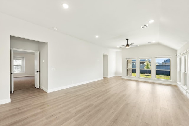 unfurnished living room with light wood-type flooring, ceiling fan, and lofted ceiling