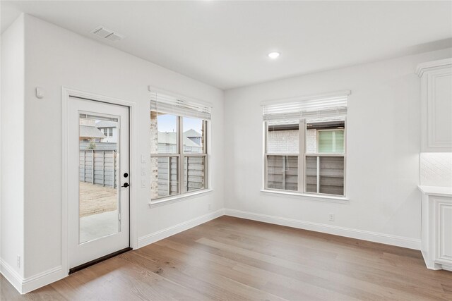 carpeted living room featuring lofted ceiling, french doors, and ceiling fan