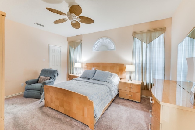 bedroom with ceiling fan and carpet