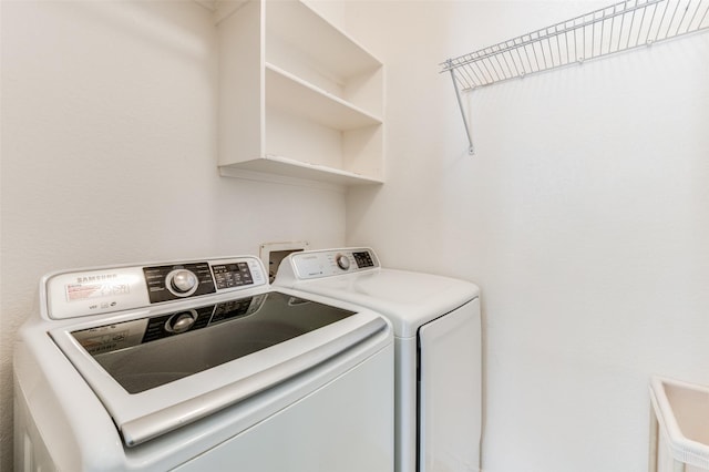 laundry room with washer and clothes dryer