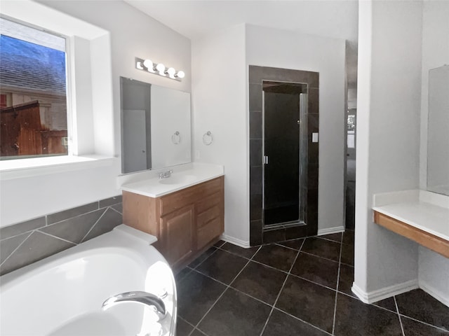 bathroom featuring vanity, tile patterned floors, and shower with separate bathtub