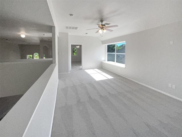 interior space featuring ceiling fan