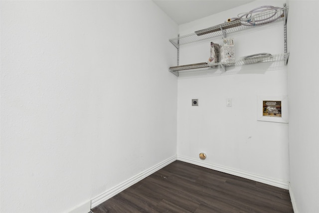 clothes washing area with hookup for an electric dryer, dark wood-type flooring, and washer hookup