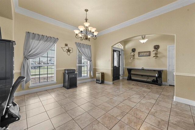 living room featuring ornamental molding, a notable chandelier, and light tile patterned floors