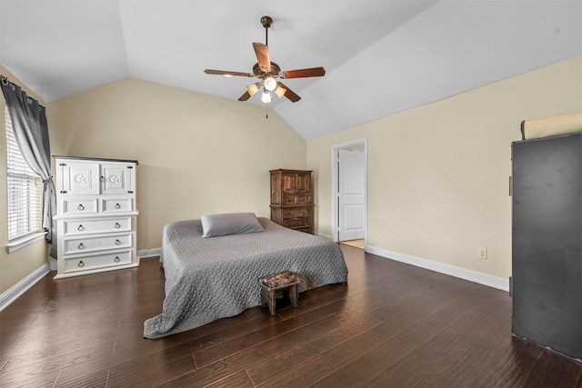 bedroom with ceiling fan, wood-type flooring, and vaulted ceiling