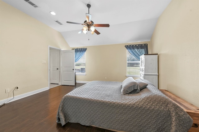 bedroom with lofted ceiling, hardwood / wood-style floors, and ceiling fan