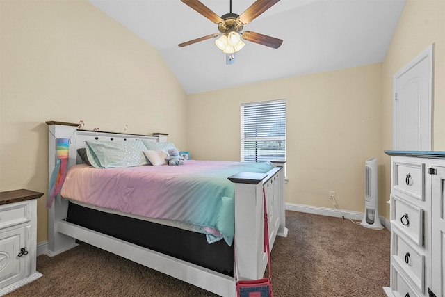 bedroom with vaulted ceiling, dark colored carpet, and ceiling fan