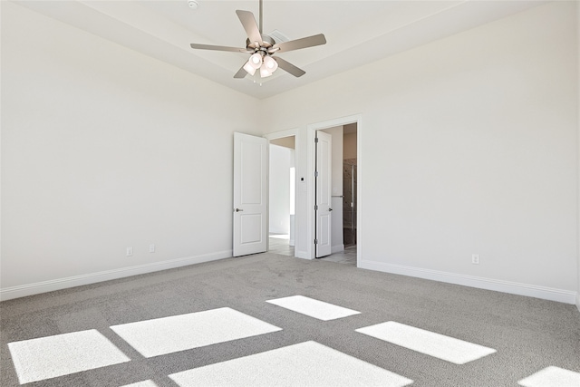 unfurnished room with light carpet and ceiling fan