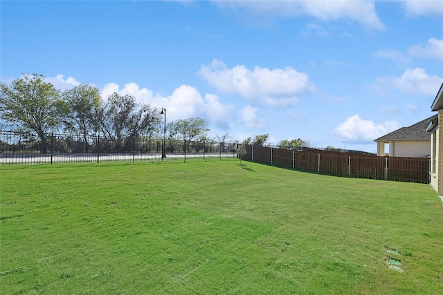 view of yard with fence